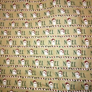 FABRIC Noel all over Stripes of words with Santa heads, Christmas fabric